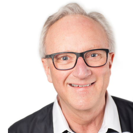 Göran Fredriksson har vit skjorta och grått hår